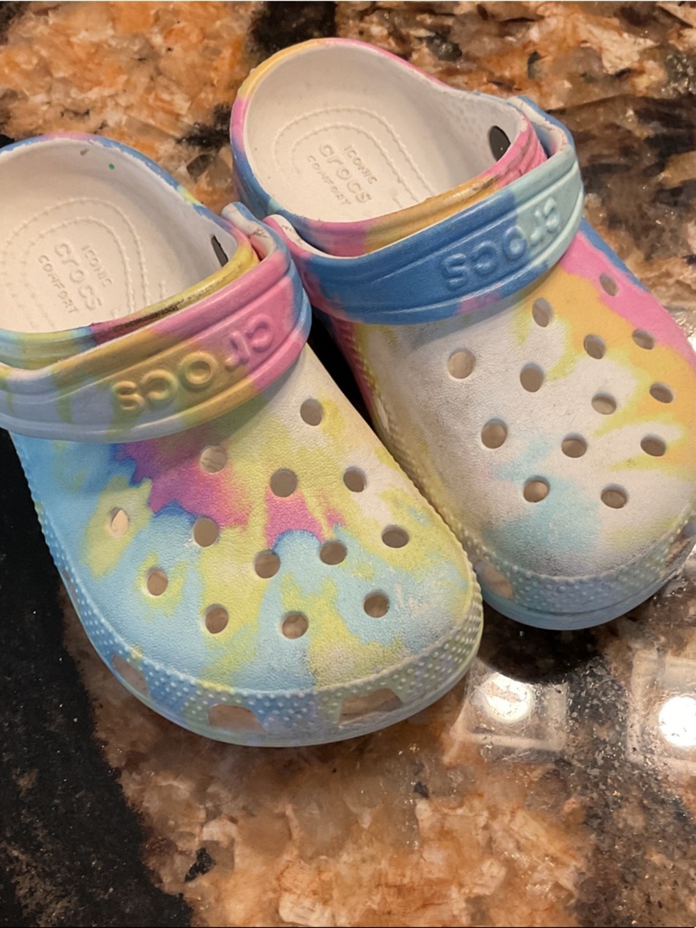 CROCS Kids Tie-Dye Slip-On Clogs in Pastel Blue, Pink & Yellow